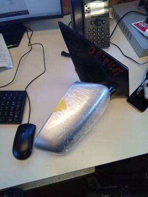 A computer keyboard and mouse on top of a desk.
