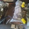 A car engine is sitting on some pallets