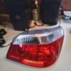 A red and white car tail light on top of a table.