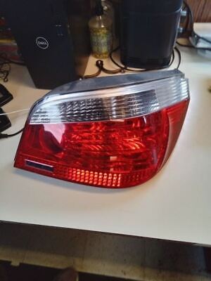 A red and white car tail light on top of a table.