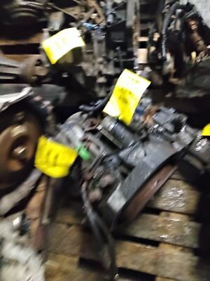 A bunch of old cars that are in the warehouse