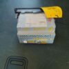 A box with some papers on it