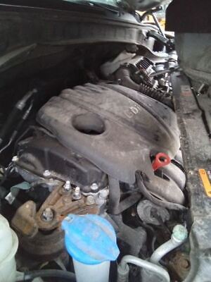 A car engine with some parts missing.