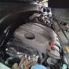 A car engine is shown in the middle of its life.