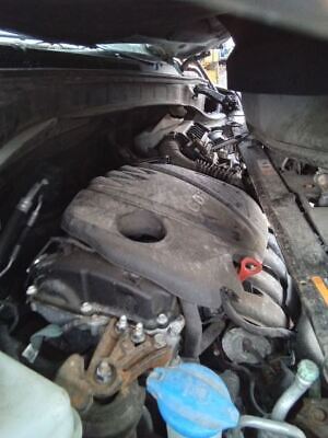 A car engine is shown in the middle of its life.