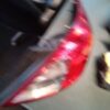 A blurry picture of the back end of a car.