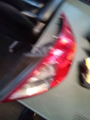 A blurry picture of the back end of a car.