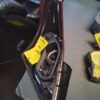 A car seat that has been broken off and is in the middle of its frame.