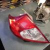 A car 's tail light is on the table.