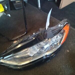 A car headlight that has been broken off.