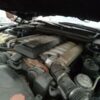 A car engine with many different parts in it