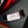 A black and white picture of a phone on the table