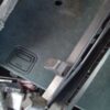 A close up of the door on an old refrigerator.