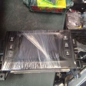 A car radio is wrapped in plastic and ready for shipping.