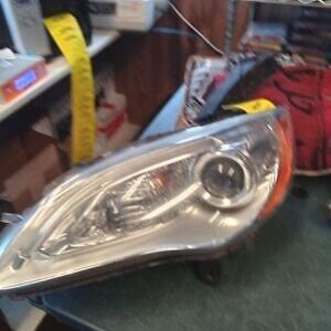 A close up of the headlight on a car