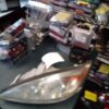A car headlight sitting on top of a table.