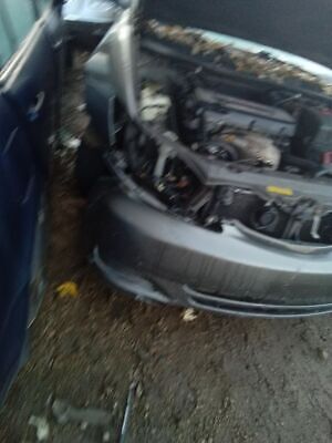 A car that has been hit by a truck.
