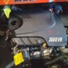 A car engine with the word " 3 5 0 8 vb " on it.
