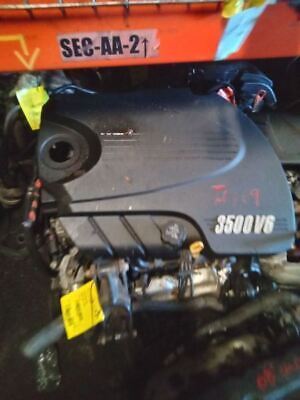 A car engine with the word " 3 5 0 8 vb " on it.