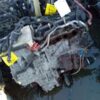 A car engine that is sitting in the water.