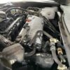 A car engine with many different parts in it