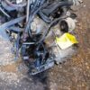 A car engine that is sitting on the ground.