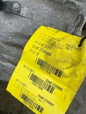 A yellow tag on the back of a bag.