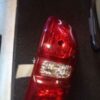 A red and white light on the back of a truck.