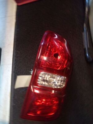 A red and white light on the back of a truck.