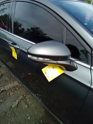 A car with yellow tags on the side of it.