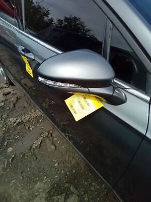 A car with two yellow signs on the side of it.