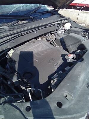 A car that has been broken down and is in the sun.