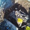 A pile of rubble sitting on top of the ground.