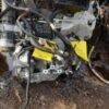 A car engine with wires attached to it.