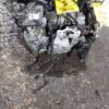 A car engine that is sitting on the ground.
