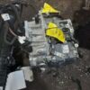 A car engine with some wires attached to it