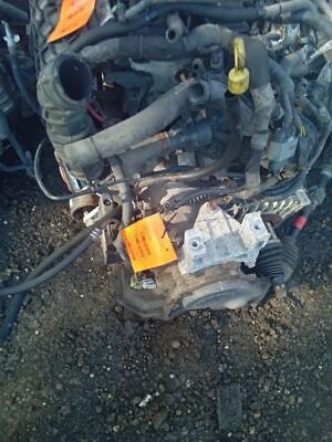 A car engine with some wires attached to it