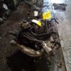 A car engine that is sitting on the ground.