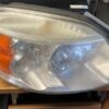 A close up of the headlight on a car