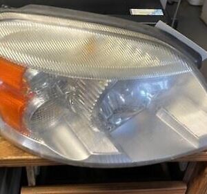 A close up of the headlight on a car