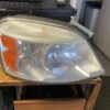 A close up of the headlight on a car