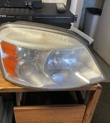 A close up of the headlight on a car