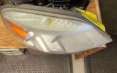 A close up of the side of a car headlight.