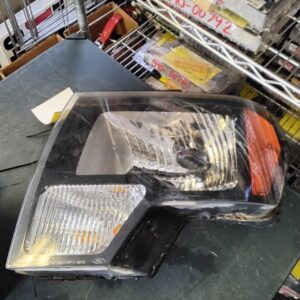 2010-214 FORD F150 PICKUP Driver Headlight Halogen Black Border Trim